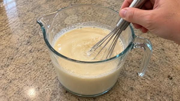 Step 6: Whisk the evaporated milk