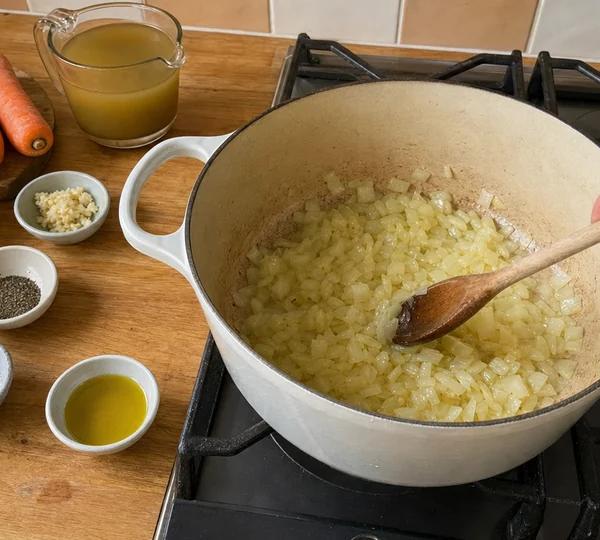 Step 2: Fry onions in olive oil