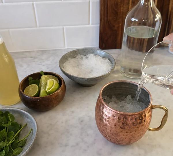 Step 4: Pour in 60ml of vodka