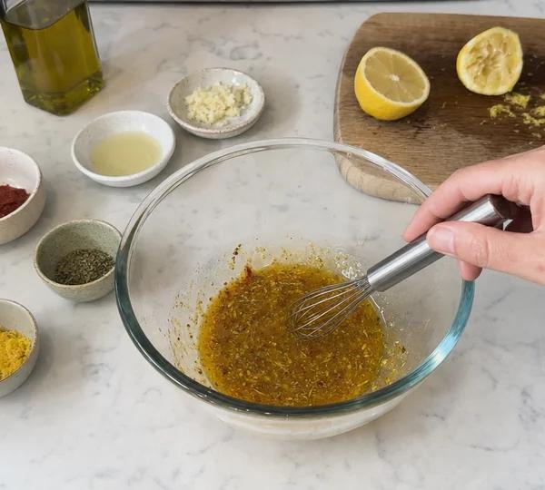 Step 2: Whisk the lemon zest