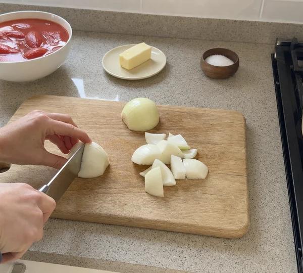 Step 1: Peel the onion and cut