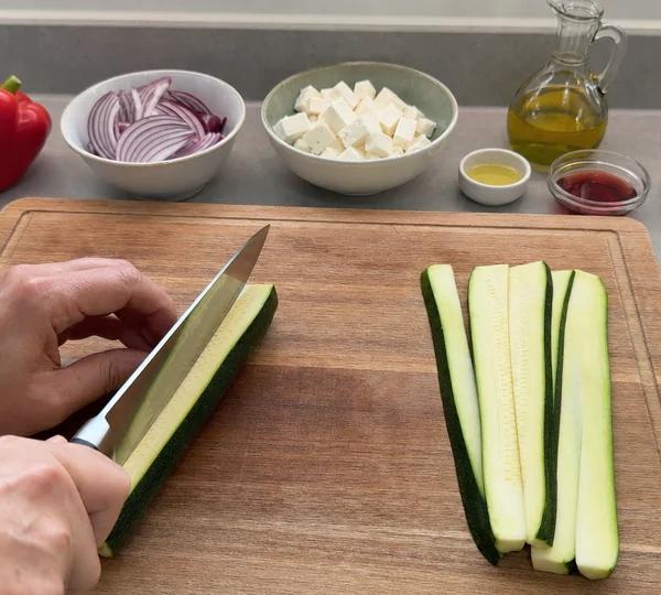 Step 2: Slice the courgette lengthways