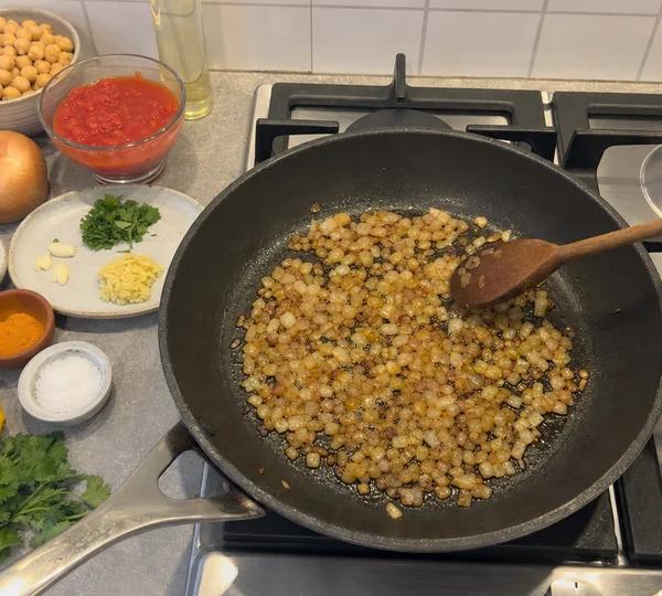 Step 2: Cook the diced onion 7min