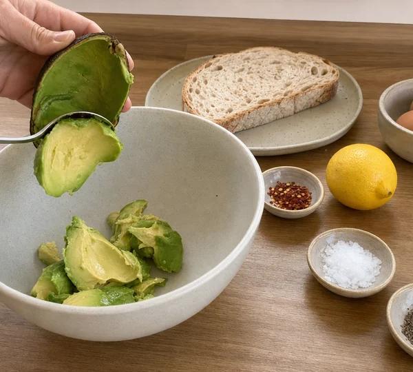 Step 2: Scoop the avocado