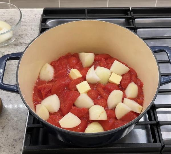 Step 2: Combine tomatoes and onion