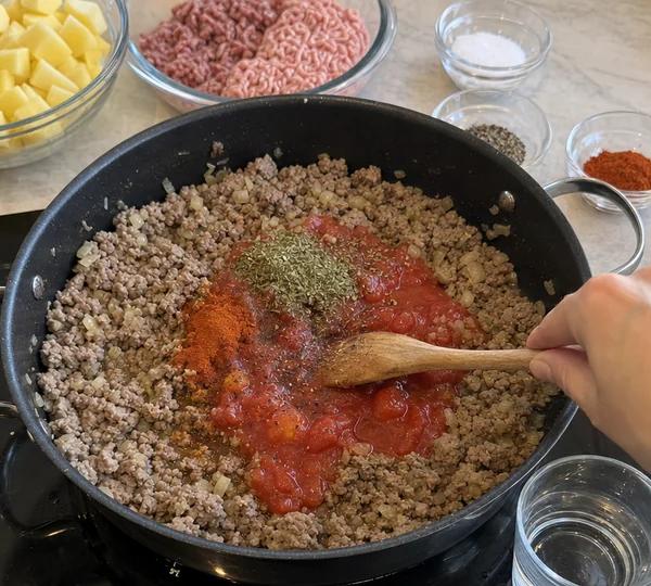 Step 6: Stir in the paprika