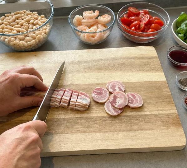 Step 3: Cut the bacon into rounds