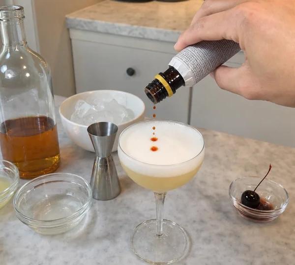 Step 4: Drop 3 dashes of Angostura