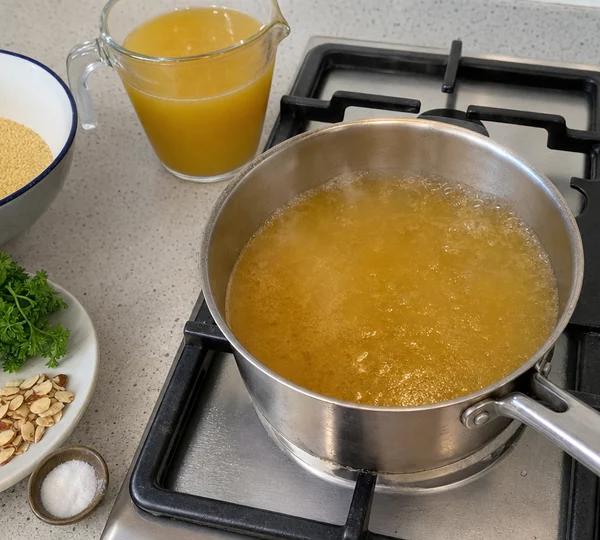 Step 1: Bring the vegetable stock