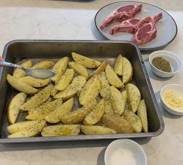 Step 2: Cut the potatoes into wedges