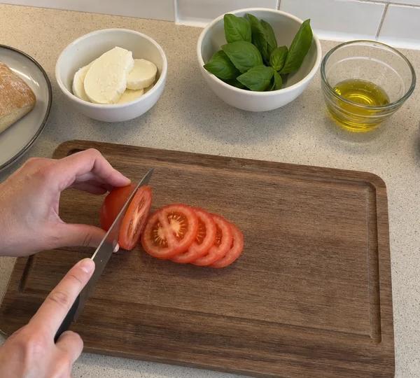 Step 3: Slice the tomato into rounds