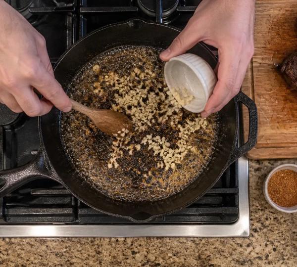 Step 6: Add garlic and cook