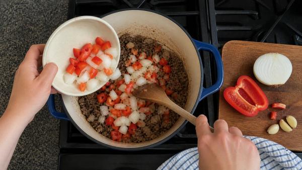 Step 6: Soften the onion and pepper