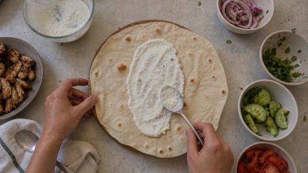 Step 8: Spread sauce on flatbread