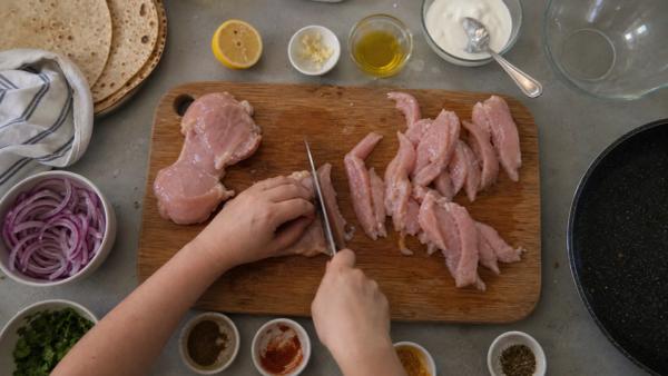 Step 1: Slice the chicken into strips