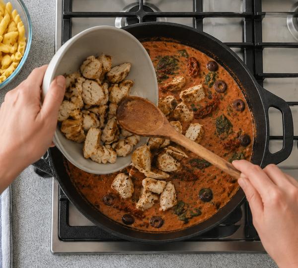 Step 10: Return chicken to pan