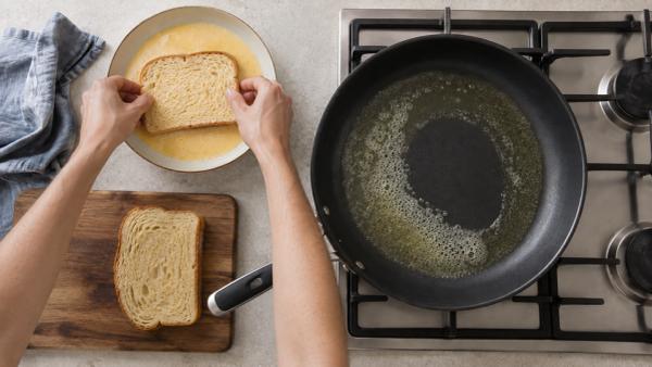 Step 8: Dip each slice of bread
