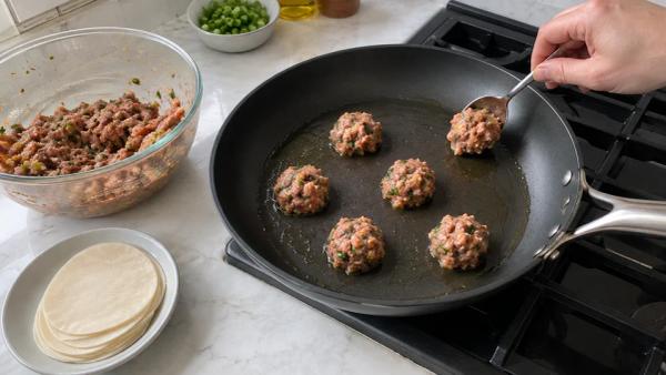 Step 2: Scoop mounds into the pan