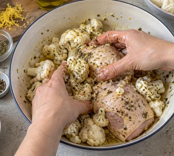 Step 2: Coat the chicken and cauliflower
