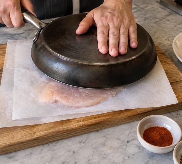 Step 1: Flatten and season the chicken