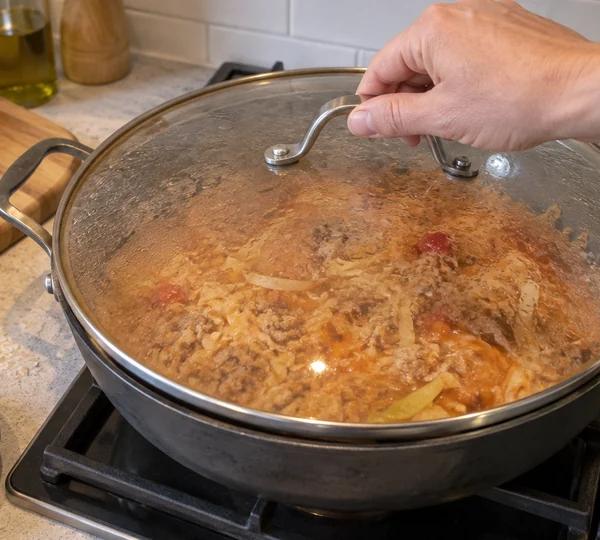 Step 5: Simmer under a lid