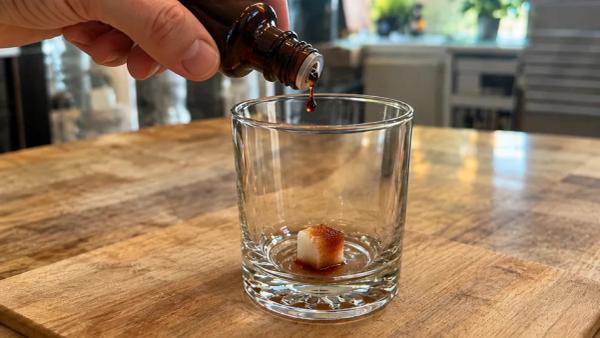 Step 2: Soak the sugar with bitters