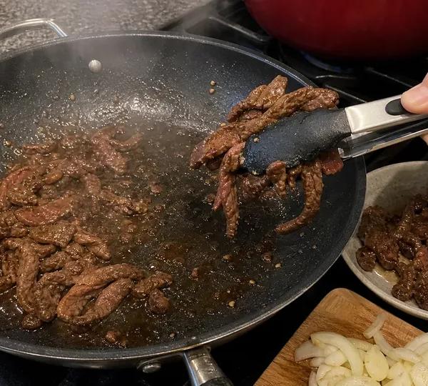 Step 6: Add marinated beef and sear