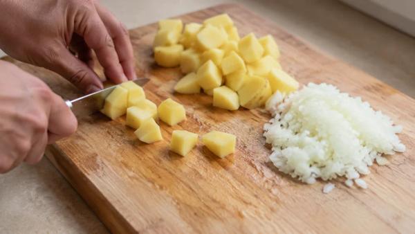 Step 2: Peel and dice the potatoes