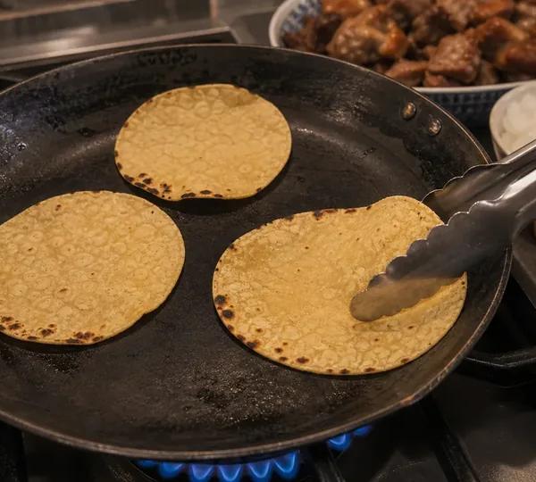 Step 9: Warm the tortillas
