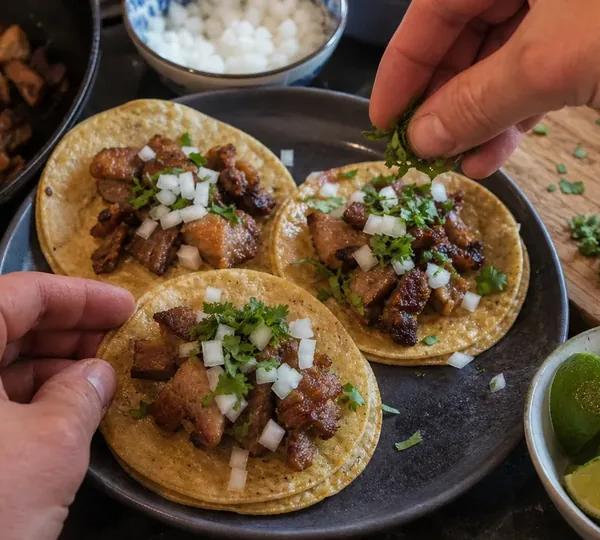 Step 11: Pile crispy carnitas