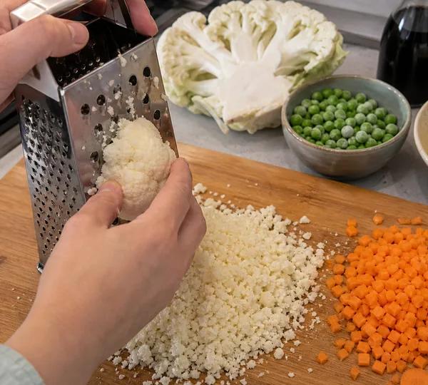 Step 1: Rice the cauliflower