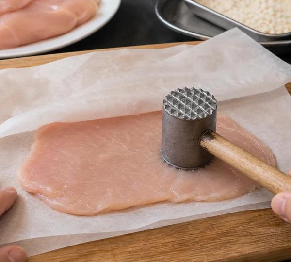 Step 1: Flatten the chicken