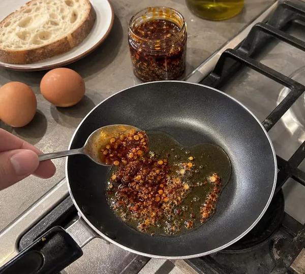 Step 1: Heat the Chili Oil