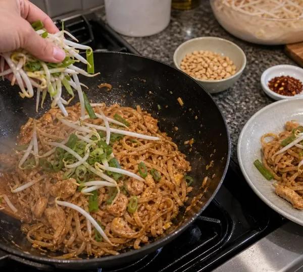 Step 18: Add sprouts and spring onion
