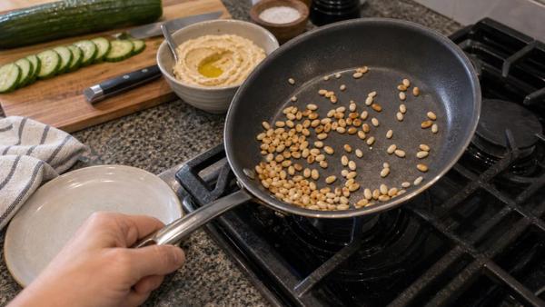 Step 2: Add the pine nuts