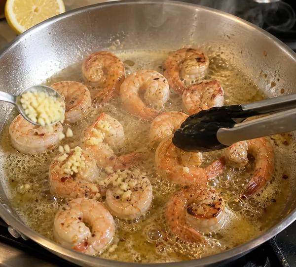 Step 4: Flip & Add Garlic