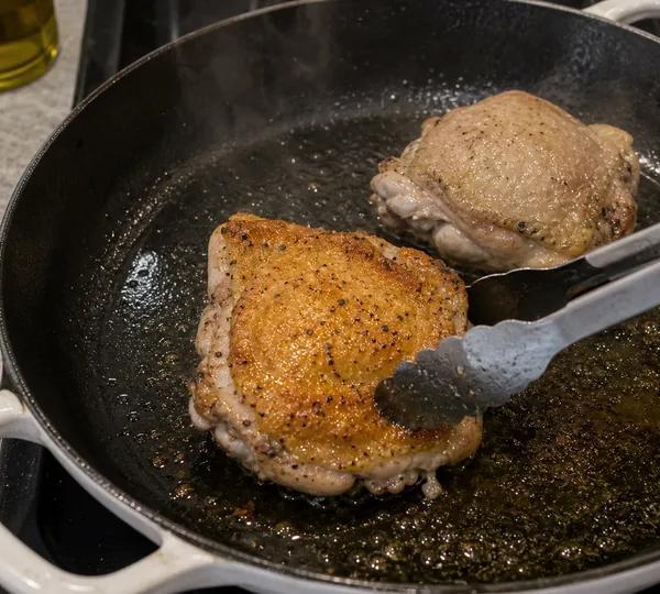 Step 5: Place thighs skin-side down