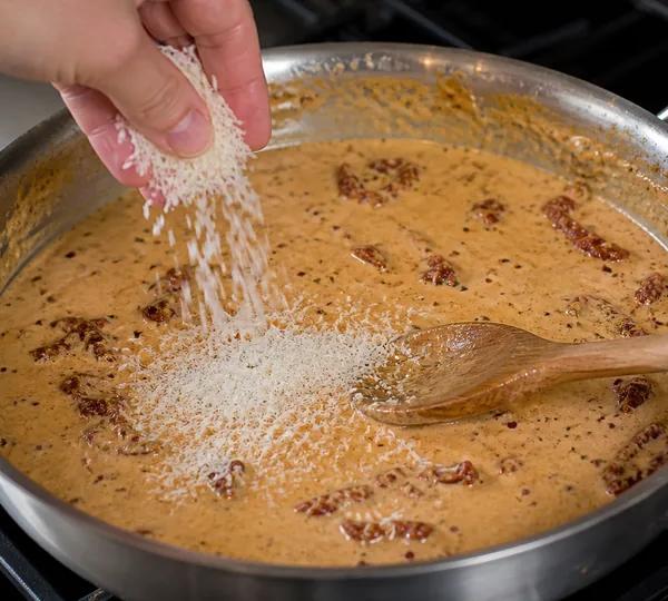 Step 4: Melt in the parmesan