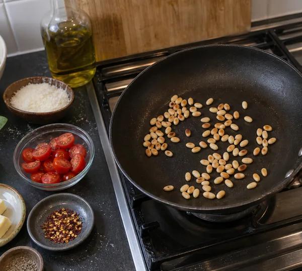 Step 1: Toast Pine Nuts