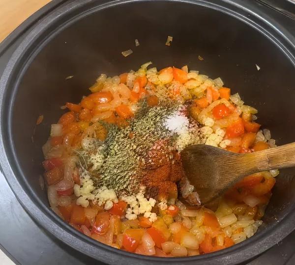 Step 3: Stir in garlic and cook