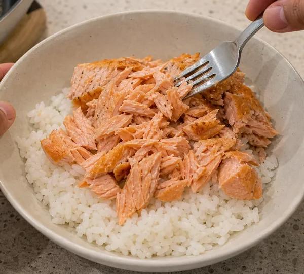 Step 3: Flake over the rice