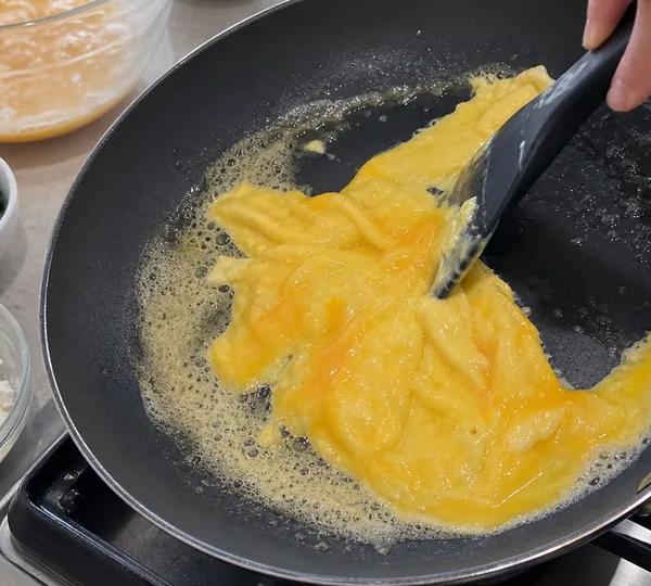 Step 7: Tilt the pan and pull