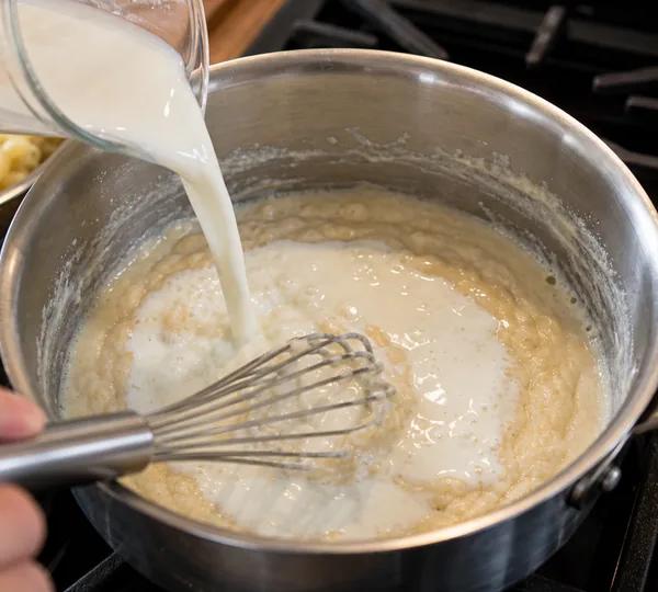 Step 3: Whisk in the milk