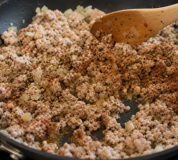 Step 11: Stir in garlic