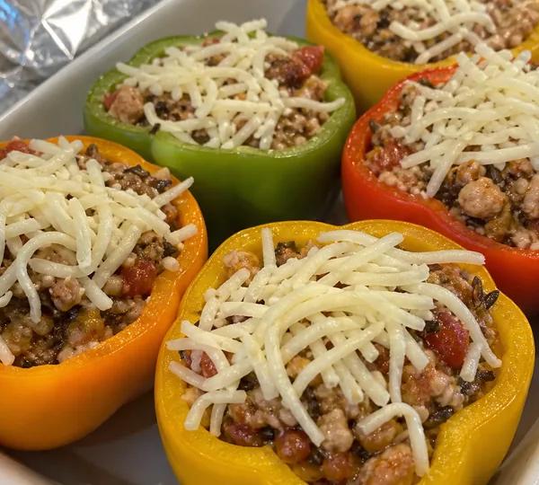 Step 15: Spoon filling into each pepper