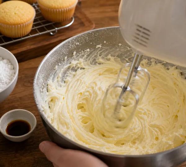 Step 12: Add vanilla and heavy cream